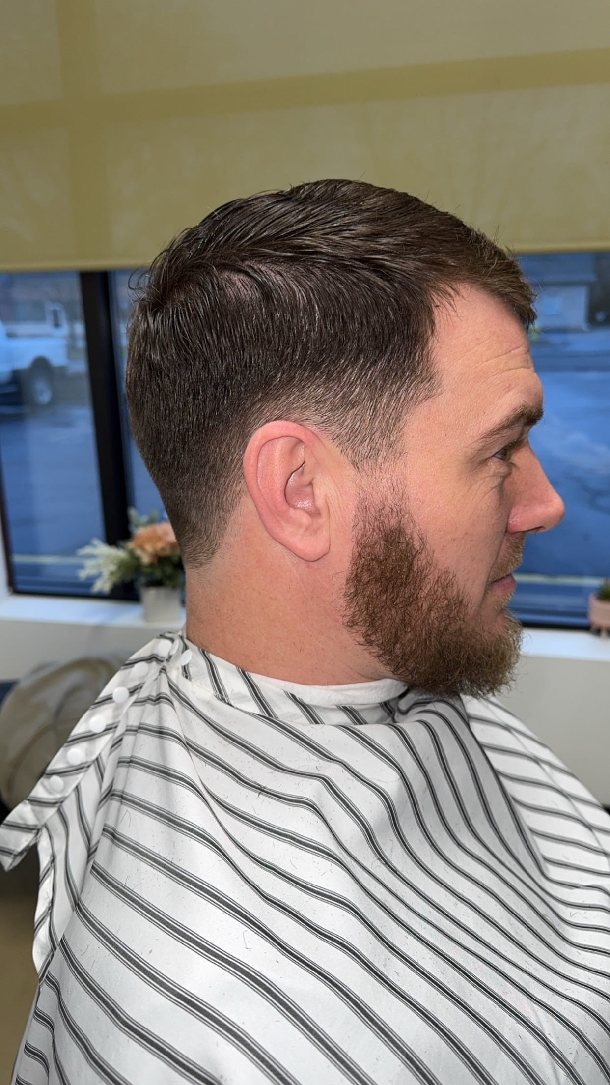 Men's haircut side profile at 88 Mane Street
