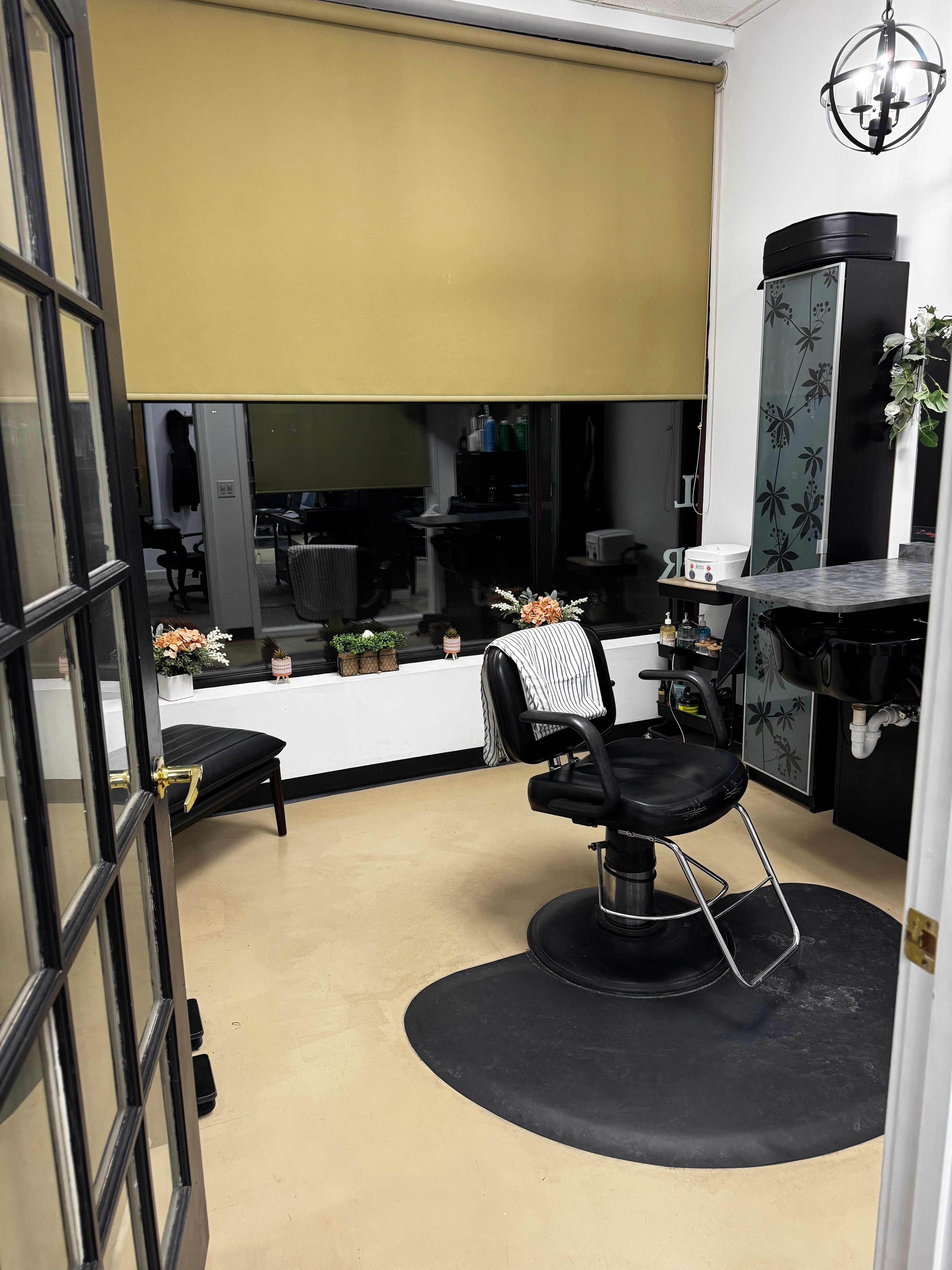 Inside 88 Mane Street salon styling station